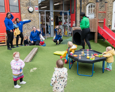 nursery-children-with-staff-in-the-garden