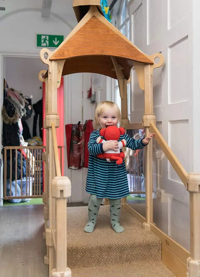 learning to climb stairs in the babies room